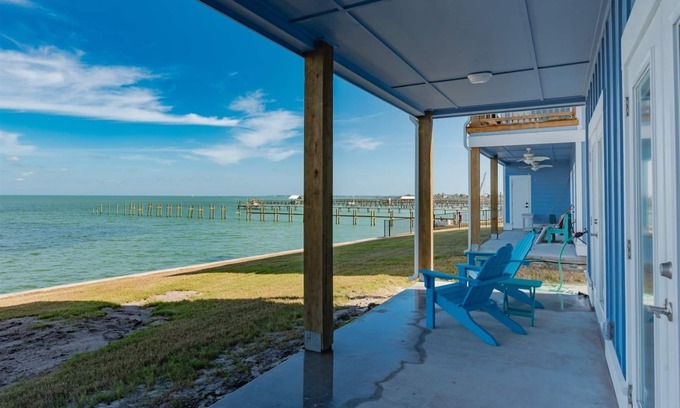 Rockport Condo | Sweeping views of Copano Bay from this newly constructed ground floor condo with a pool and a new fishing pier!