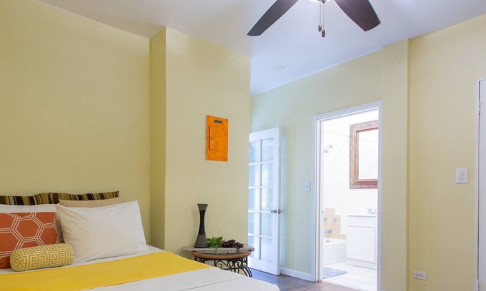 Downtown Nassau Apartment | Tangerine Sunsets Murcott