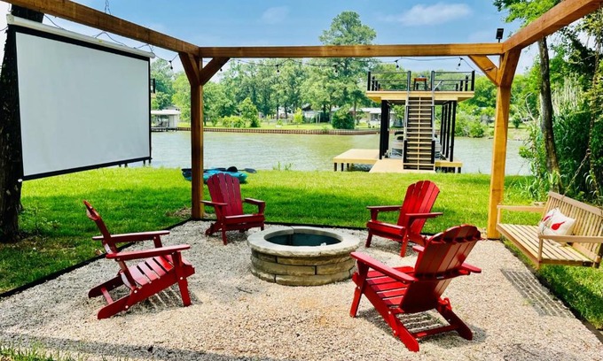 Gun Barrel City House | The Benjamin I - 2022 Built Luxury Retreat with Backyard Paradise with Hot Tub Outdoor Movie Screen Dock & Boat Rental