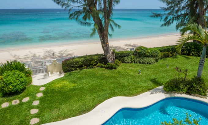 Old Trees Bay Apartment | The Casuarinas at Old Trees 201, a luxury beachfront villa on the West Coast of Barbados.