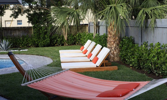 West Palm Beach Villa | The Coral Villa - Heated Pool Spa and Lush Garden