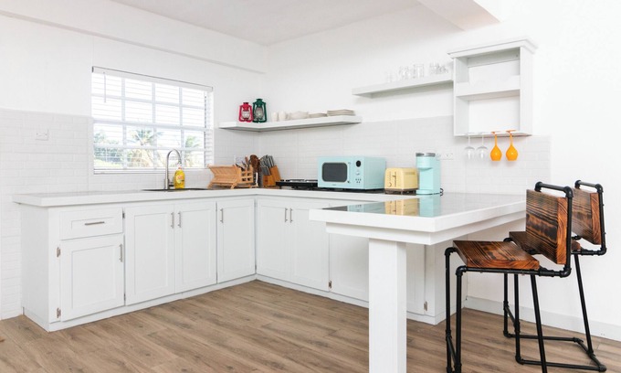 Kingstown Apartment | The Cottage is an open concept studio with contemporary space & rustic features.