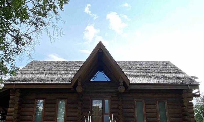 East Central Saskatchewan House | The Lodge-Unique log home on the banks of the river