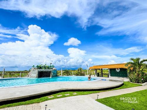 San Fernando Villa | THE OASIS RESORT CondoBimbo 1-Big Room, Balcony, kitchen, Pool, Wifi, Videoke