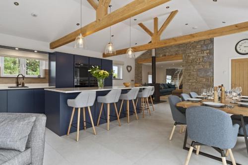 Porthyrhyd House | The Old School House - A Superb Newly Converted Barn with Hot Tub Sleeping 8 guests