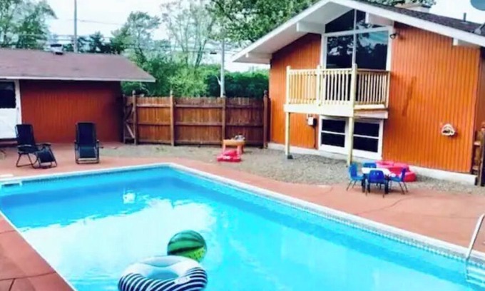Eden House | The Orange House with heated pool, Sleeps 8