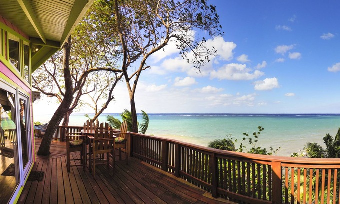 Orchid Beach Village House | The Pink Orchid: Breathtaking Ocean Views from Waterfront Home