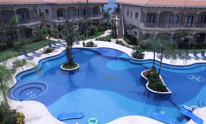 Lighthouse Estates Villa | The SandBarr - Luxury Ocean Front 3 Bed/3 Bath Villa with private roof top pool