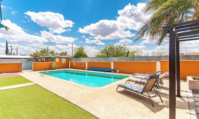 The Garden District House | This centrally located 3 bedroom 2 bathroom features a full size pool and electric vehicle charging on site.
