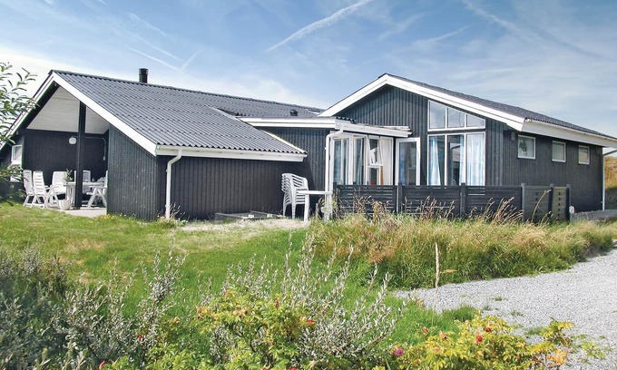 Rindby Strand House | This renovated cottage has among other things a beautiful kitchen with skylight, window front to the