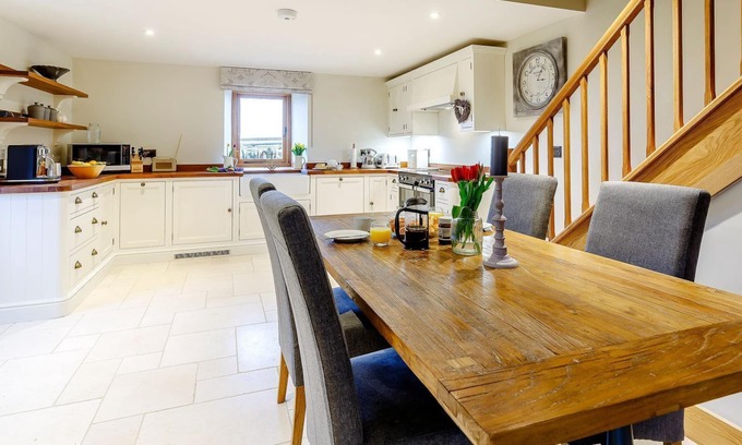 Bourton Cottage | This spacious modern barn conversion is a perfect base for up to four people to explore the quaint v
