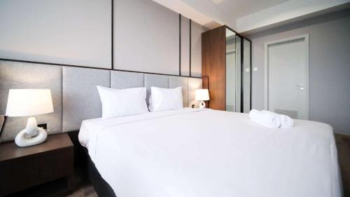 Surabaya Apartment | Tidy and Spacious 2BR at Grand Sungkono Lagoon Apartment By Travelio