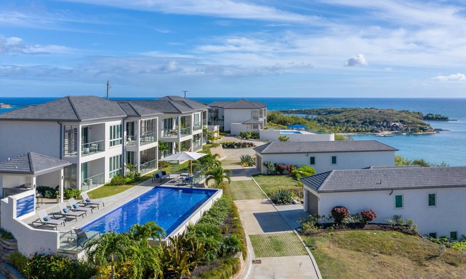 Calvigny Condo | Tiger's Eye Luxury and Ocean views! Stylish interior
