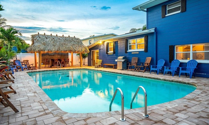 Cocoa Isles House | TIKI BLUE: 5 BedRm Beach House: Heated Pool + Hot Tub + Tiki Bar