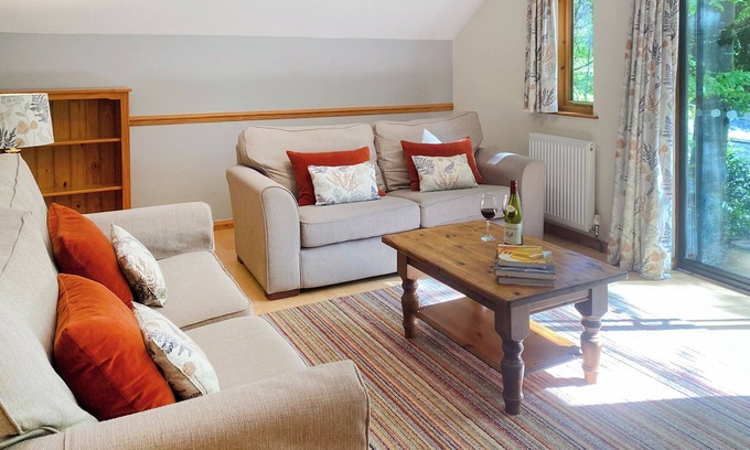 Westleigh Ski Chalet | Timber lodge set in an elevated position with views of the lake.