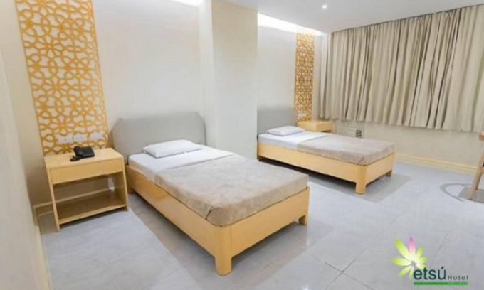 Downtown Tacloban Apartment | Timeless Elegance: Embrace Comfort at Etsu Hotel's Studio