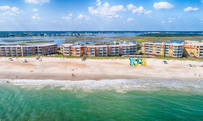 Sneads Ferry Condo | Topsail Dunes 3208| Community Pool | Oceanfront Condo Complex