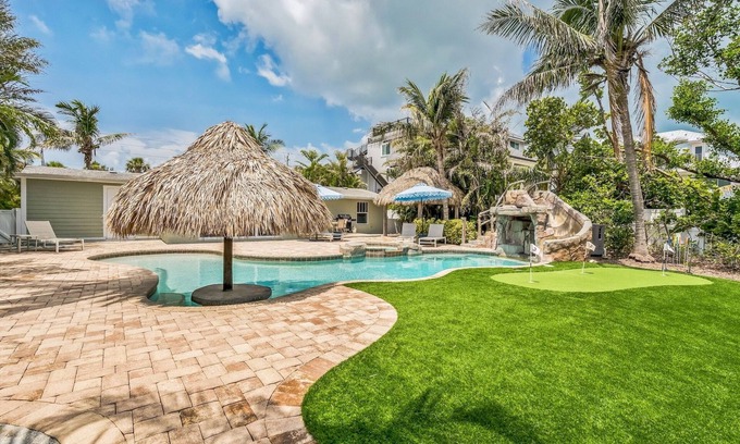 Anna Maria House | Tortuga Bay~Canal & Waterslide Putt Putt! KAYAKS & TIKI HUT