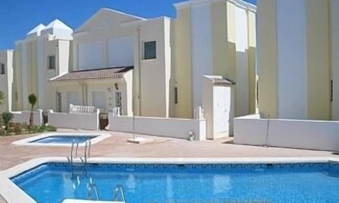 Quesada House | Townhouse With Air Conditioning And Shared Heated Pools (not heated in Winter)