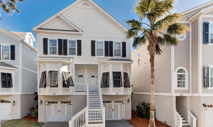Waters Edge House | Townhouse with marsh and river views, shared pool, & outdoor shower