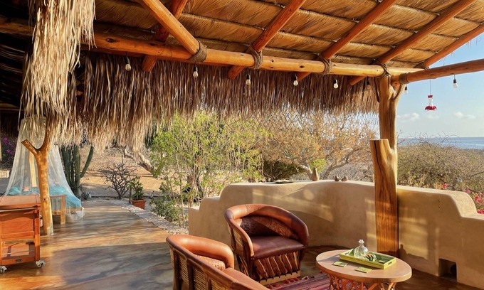 Cabo Pulmo House | Traditional stone palapa retreat with ocean and desert views