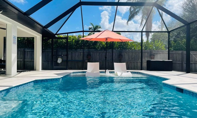Naples Park House | Tranquil 3br/2ba Home with Heated Saltwater Pool