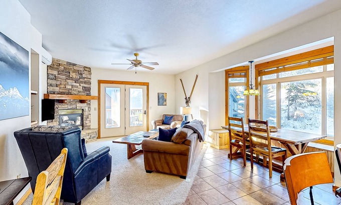 Whitefish Condo | Tranquil dog-friendly alpine retreat with fireplace & balcony - steps to slopes