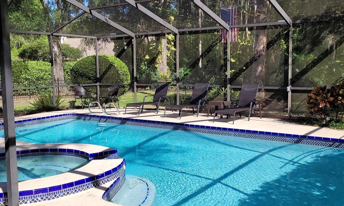 Temple Terrace House | Tropical Oasis with Lanai, Pool and Dock. Sleeps 12 guests