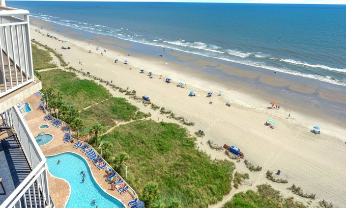 Atlantic Beach Condo | Tropical oceanfront resort with shops, restaurants, pools, lazy river--paradise!