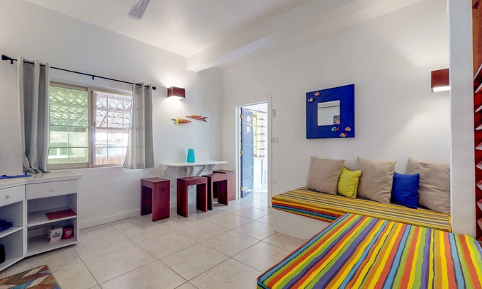 Caye Caulker Apartment | Tropical studio with partial AC & WiFi - 5 minutes to water taxis and the beach