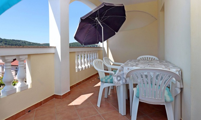 Lopar Apartment | Two bedroom apartment with terrace Lopar, Rab (A-14804-d)