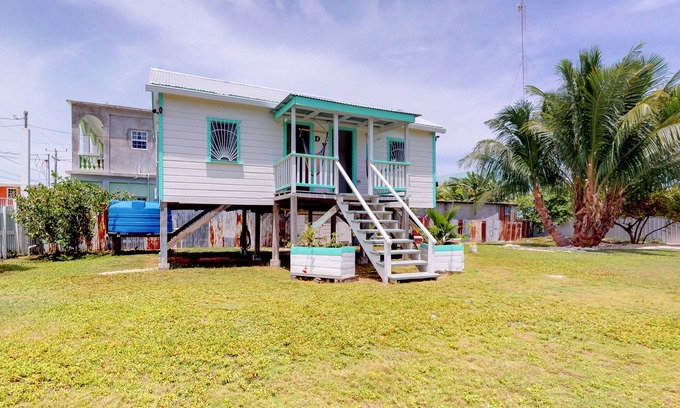 Caye Caulker House | Two Newly Renovated Studios with Spacious Yard, Grill, WiFi, and Partial AC