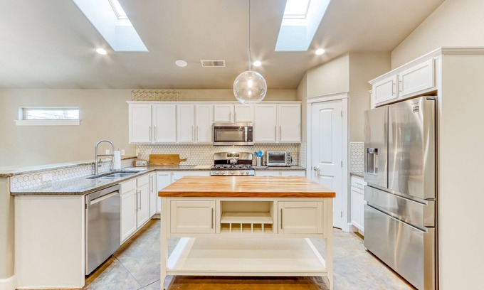 Boyd Acres House | Two-story, dog-friendly home with central AC, washer/dryer, wood stove, & yard