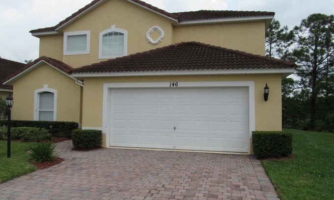 Lake Wilson Preserve House | Two story, spacious 4/3 Pool Home at Lake Wilson Preserve. Backed to a conservation area for enhance