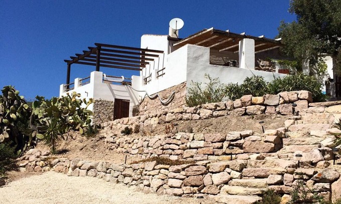 Carloforte House | Typical small house of San Pietro with a view of the countryside and the sea, a Moorish guard resort