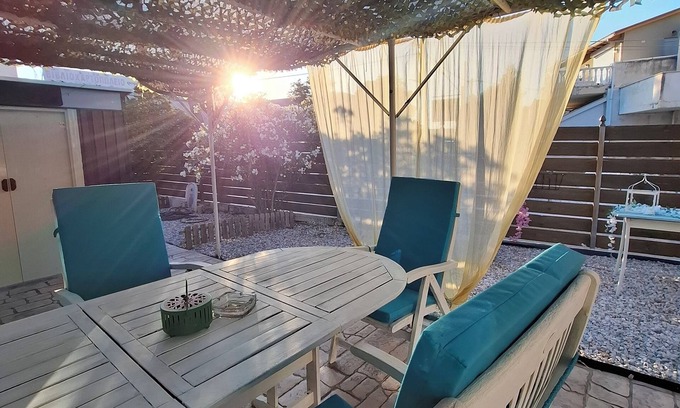 Spata-Artemida Apartment | Under the old olive tree - a place we call home