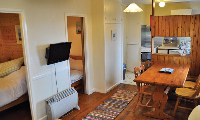 Berrynarbor Cabin | Unique, peaceful, cosy and quaint cedar wood built holiday lodge.