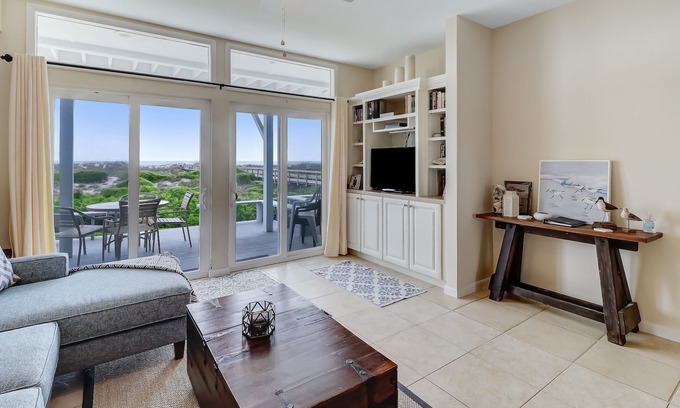 Fernandina Beach House | Updated oceanfront townhouse, private decks & pool. Easy beach access; vehicles permitted on beach.