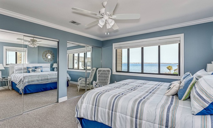 Pensacola Beach House | Updated waterfront condo. Short walk to the Beach! Family friendly