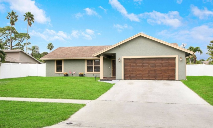 Royal Palm Beach House | Upscale 4BR Oasis- Tranquil Patio, Prime Location