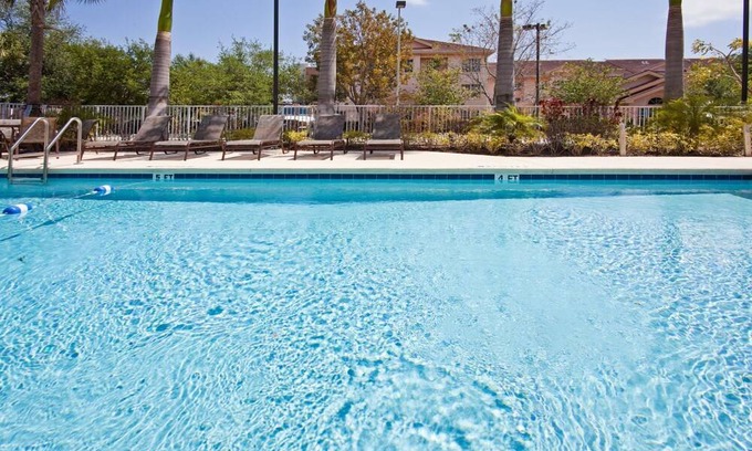 Villages of Palm Beach Lakes Hotel | Holiday Inn Express & Suites West Palm Beach Metrocentre, an IHG Hotel