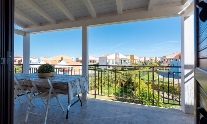 Campofelice di Roccella House | Vacation Home "In Villaggio Centopini" with Shared Pool, 2 Balconies & A/C