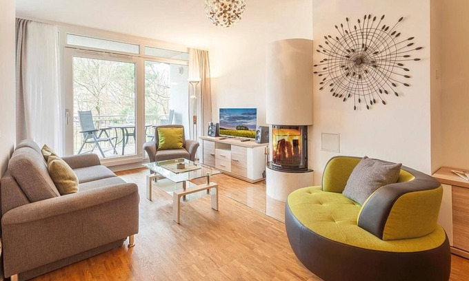 Binz Apartment | Vacation apartment with underfloor heating, wood-burning stove and balcony - only 150 m to the beach