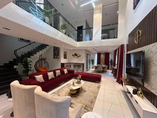 Lekki Phase 1 Apartment | VACATION HOMES - 5 bedroom private compound home in lekki phase 1 - rooftop, pool, spa, cinema, 24h light & security