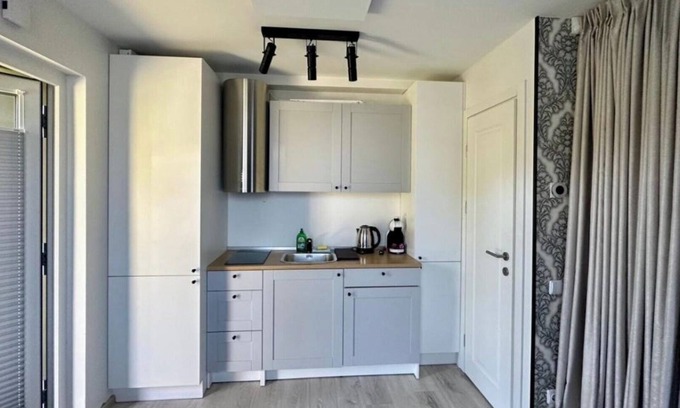Palanga Apartment | Vaivorykstes Namai with Heated Pool by Hostlovers