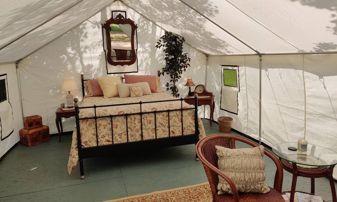 Glacier Country Cabin | Victorian Dream, glamping by the river, 2 miles from Quinn's Hot Springs Resort.