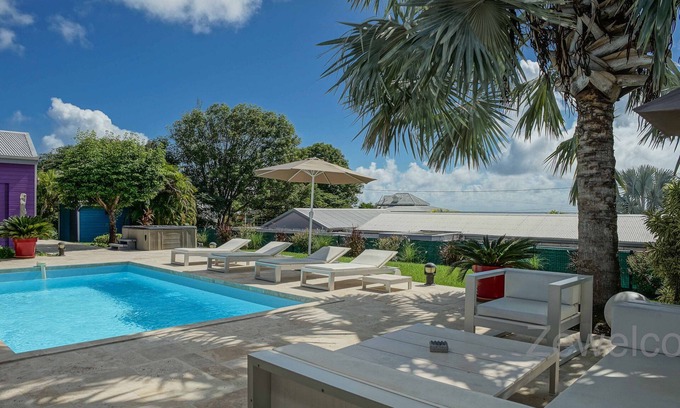 Saint-Francois Villa | Villa Azur - La Coulée Bleue - swimming pool, sea view, spa, 8 people