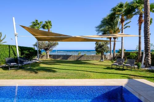 Oroklini Villa | Villa Goldfish - 5BR Beachfront Luxury with Pool & Jacuzzi