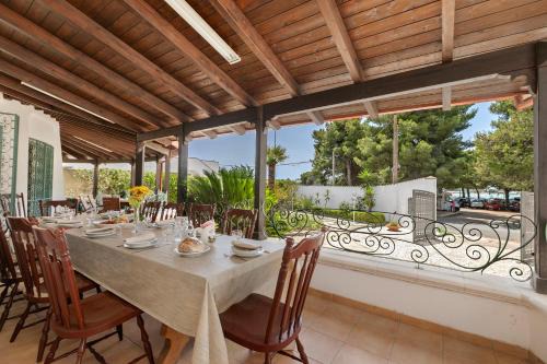 Sant'Isidoro House | Villa Isidoro Sea View - Happy Rentals