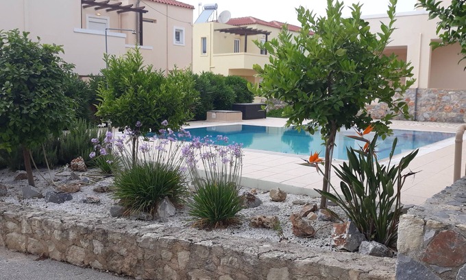 Plaka Villa | Villa Pindarakis - level walk to beach and tavernas, two pools, mountain views
